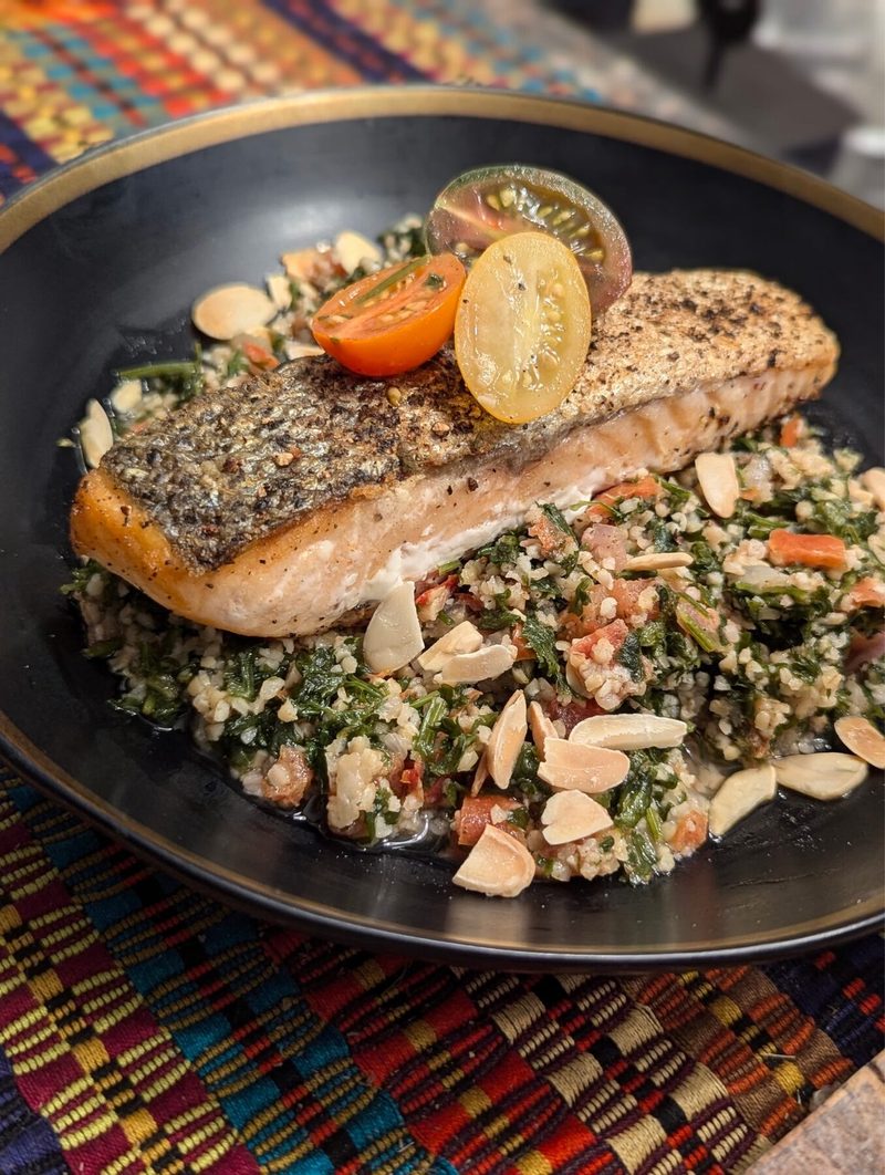 Crispy-skin salmon with tabbouleh and almonds plated by Chef Brian Schultze, private chef.